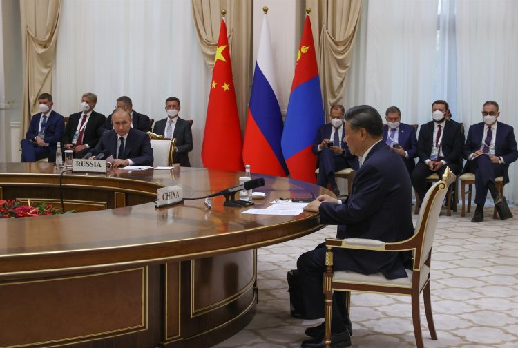 Vladímir Putin, y 
Xi Jinping