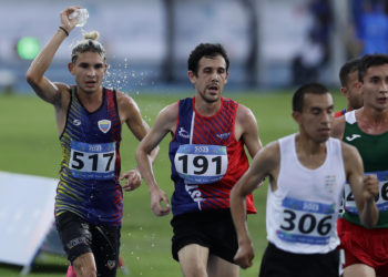 Whinton Palma y María Garrido ganan el medio maratón de Caracas