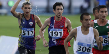 Whinton Palma y María Garrido ganan el medio maratón de Caracas