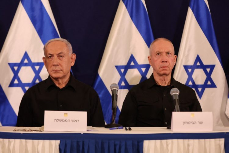 (FILES) Israeli Prime Minister Benjamin Netanyahu (L) and Defence Minister Yoav Gallant attend a press conference in the Kirya military base in Tel Aviv on October 28, 2023 amid ongoing battles between Israel and the Palestinian group Hamas. - The International Criminal Court on November 21, 2024 issued arrest warrants for Israeli Prime Minister Benjamin Netanyahu and Defence Minister Yoav Gallant, as well as a Hamas' military chief. (Photo by Abir SULTAN / POOL / AFP)