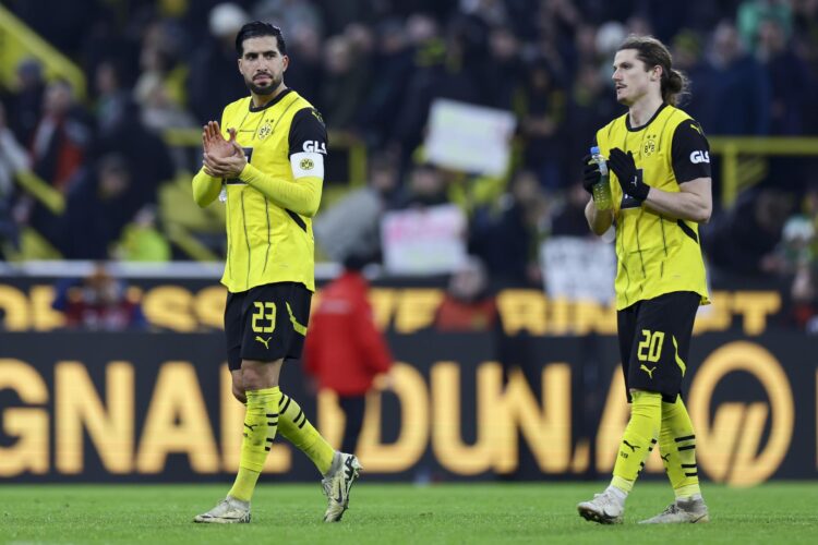 Los jugadores del Dortmund Emre Can (I) y Marcel Sabitzer (d) reacciona tras el empate de su equipo ante el Werder Bremen en Dortmund, Alemania. EFE/EPA/CHRISTOPHER NEUNDORF