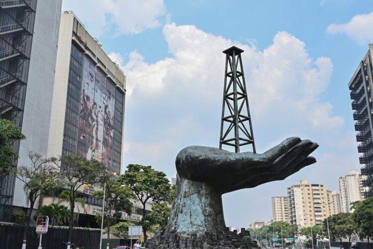 View of the "Peace Monument" sculpture outside the headquarters of Venezuelan state-owned oil company PDVSA, in Caracas, on April 22, 2020. - The OPEC alliance of oil producers said "several" member states, and some of its allies in the OPEC+ grouping, held a teleconference Tuesday to discuss the plunge in oil prices caused by the coronavirus pandemic. The organisation tweeted that ministers held an "informal teleconference to brainstorm the current dramatic oil market situation" but it was not clear whether Saudi Arabia, OPEC's largest producer, took part. A photo tweeted by the organisation appeared to show representatives from countries including Nigeria, Iraq and Venezuela taking part but there was no confirmation of which countries joined the meeting. (Photo by Federico Parra / AFP)