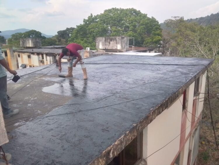 Remoción  y colocación de mantos asfalticos