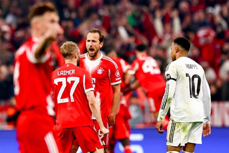 Los jugadores del Bayern Konrad Laimer (C-I) y Harry Kane (C-d) durante el partido de la UEFA Champions League en Múnich, Alemania. EFE/EPA/ANNA SZILAGYI